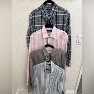 Four men’s button up shirts. Size M. Sold together or will split up for offers